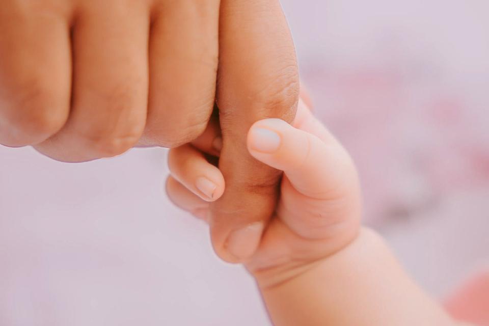 Baby Holding a Finger