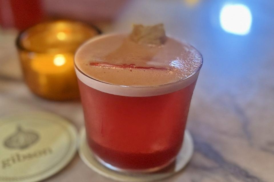 Cocktail 2 at Gibson Tenth Anniversary Expat Choice Report Singapore Rebecca Assice and Husband Robin Assice standing at the entrance of Gibson Singapore celebrating their tenth anniversary