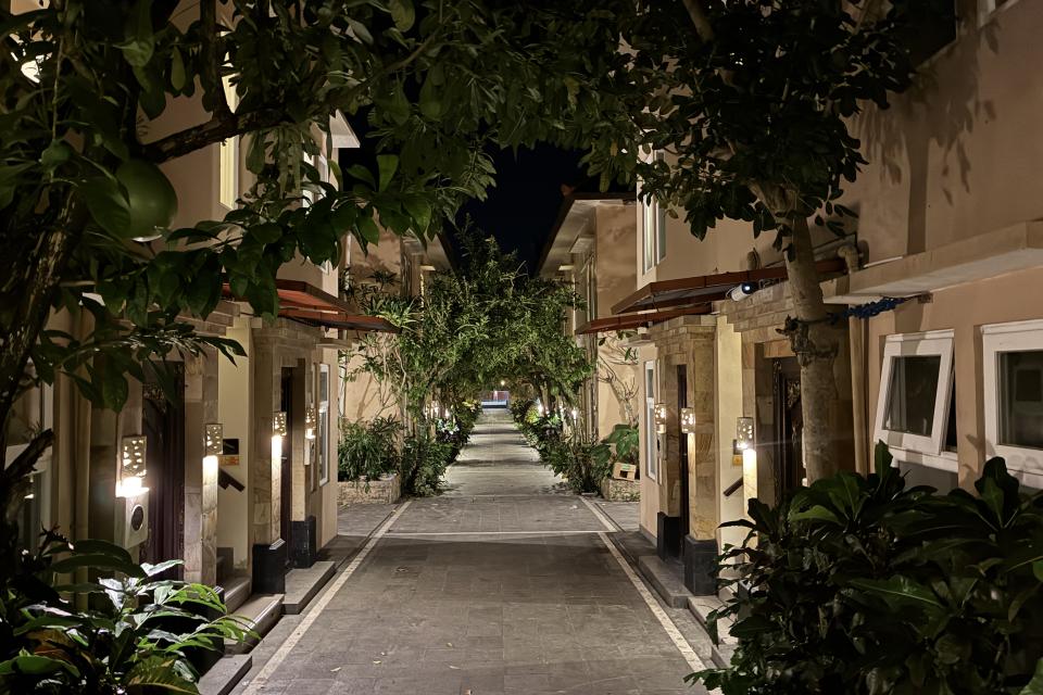 The Grand walkway to individual rooms leads to the pool area which sits overlooking a small water way and stone path leading to rice paddy preserved from hundreds of years of nurturing the firlds