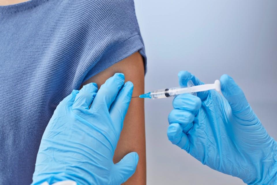 nurse-administering-vaccine-to-patient-to-prevent-hpv-and-hepatitis-b-linked-to-sti-infections