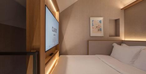 Claude Hotel China Town Singapore queen bed snug with inbuilt TV wall mounted and adjustable for perfecr viewing